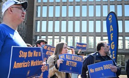 Protesters hold signs in solidarity with the American Federation of Government Employees of District 14 at a rally in support of federal workers at the Office of Personnel Management in Washington, D.C., March 4, 2025. AFGE warned that the NDA could also infringe on labor officials’ and members’ rights and duties under federal sector labor law.