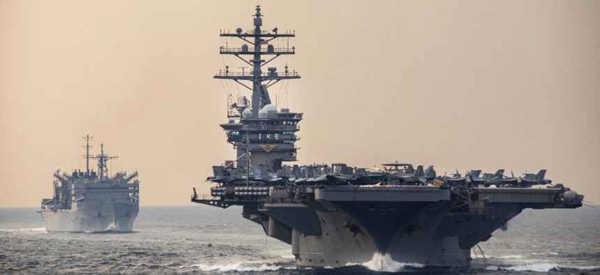 Components of the Dwight D. Eisenhower Strike Group transit the Strait of Hormuz, Dec 14, 2023. Most of the new supplemental funding, $67.1 billion, or 77% of the total, would go to the Pentagon.