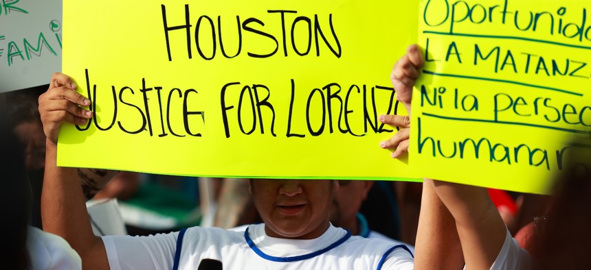 Community members gather in Houston on July 8, 2026, where Lorenzo Salgado Araujo was fatally shot the day before by U.S. Immigration and Customs Enforcement officers. Four members of Congress are demanding that ICE and Homeland Security release evidence supporting its claims that the ICE agent shot Salgado Araujo in self-defense.