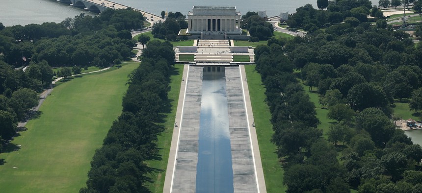 Charges of vandalism that damaged the "American Blue" lining of the Reflecting Pool, shown here on Aug. 5, were dropped recently after Jeanine Pirro, the U.S. Attorney for the District of Columbia, concluded there was no evidence to support the charges.
