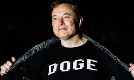 Elon Musk walks to the White House on March 9, 2025. 
