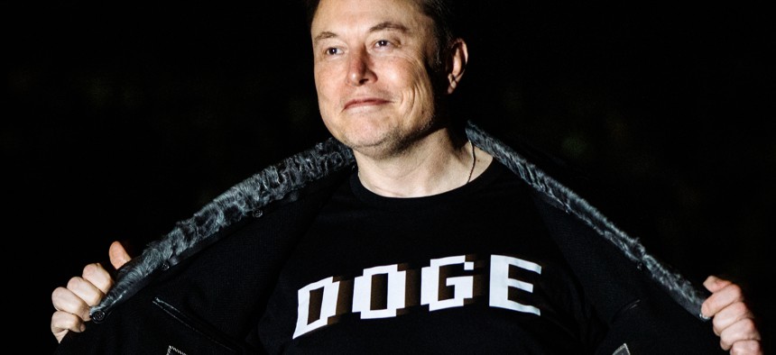 Elon Musk walks to the White House on March 9, 2025.