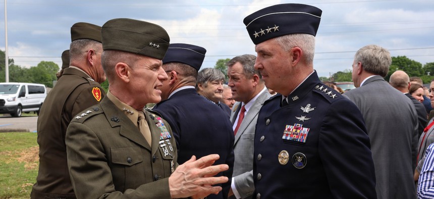 Gen. Stephen Whiting, commander of U.S. Space Command, speaks with Lt. Gen. James Adams, director of the Defense Intelligence Agency, during a ribbon-cutting ceremony at Redstone Arsenal, Ala., on April 29, 2026.