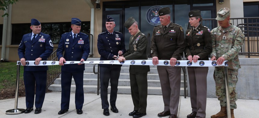 Gen. Stephen Whiting, (third from left) commander of U.S. Space Command, and Lt. Gen. James Adams, director of the Defense Intelligence Agency, cut the ribbon at ceremony on Redstone Arsenal, Alabama, April 29, 2026.