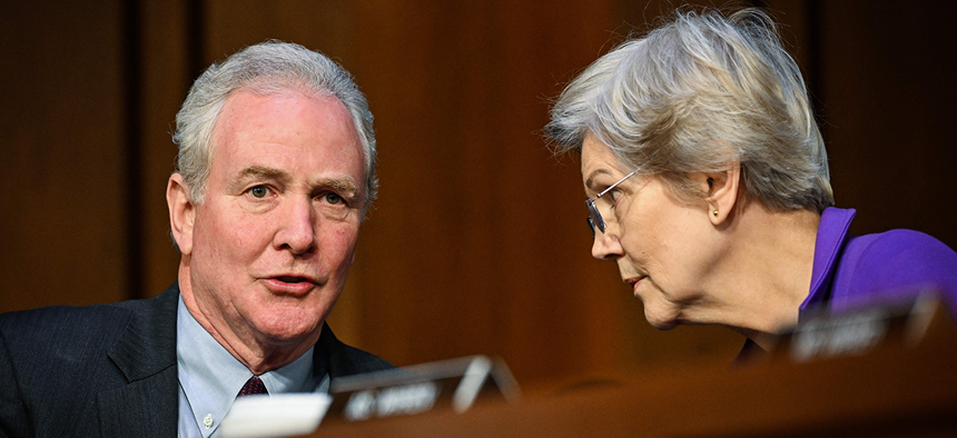 Sens. Elizabeth Warren, D-Mass. and Chris Van Hollen, D-Md. led colleagues in denouncing the suspension of advanced leave as a “cruel and unjustified plan that is likely to drive additional employees out the door."