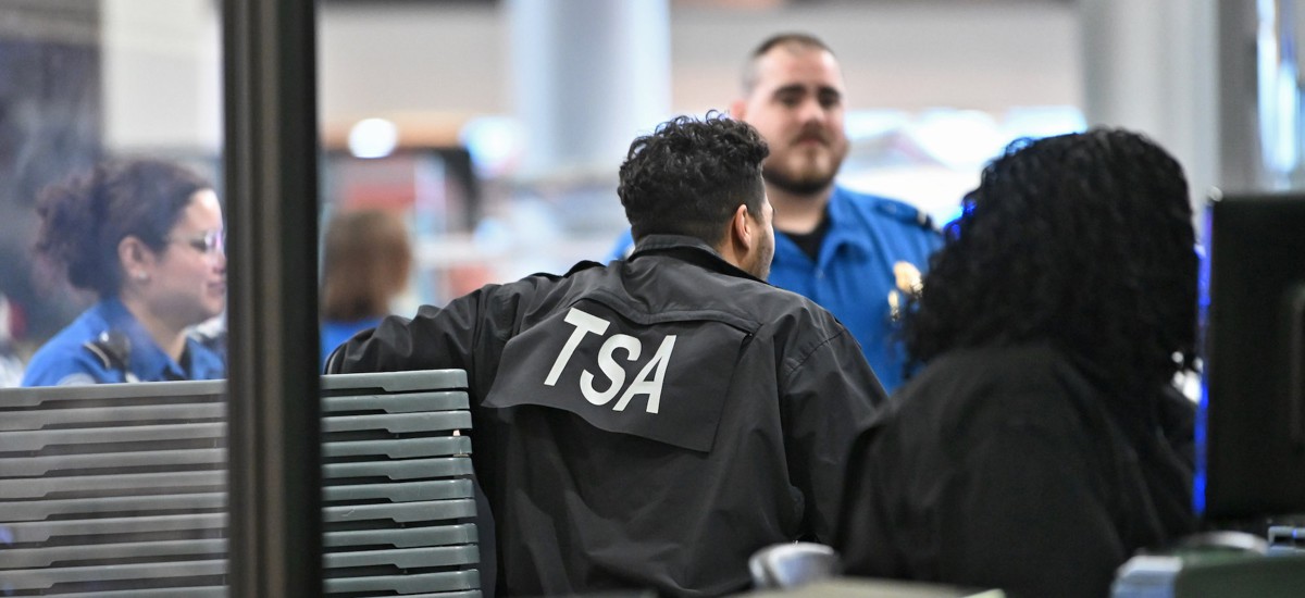 Transportation Security Administration workers at the security checkpoint at Albany International Airport on March 23. The agency said that requiring workers to stand at travel document check stations “reinforces both our security posture and our commitment to hospitality.”