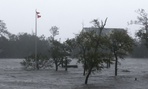 High winds and storm surge from Hurricane Florence hit Swansboro, N.C., Friday.