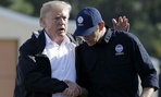 FEMA Administrator Brock Long (right) speaks with President Trump after visiting areas in North Carolina and South Carolina affected by Hurricane Florence. 