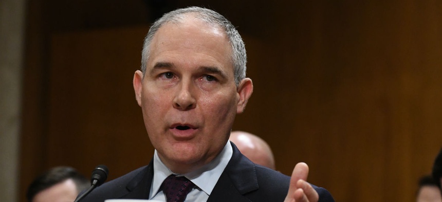Former EPA administrator Scott Pruitt testifies at his confirmation hearing.