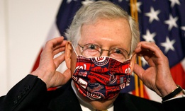 Senate Majority Leader Mitch McConnell leaves a news conference after attending a Republican luncheon on July 21. McConnell has said the series of bills Republicans and the White House put forward would only mark a starting point in negotiations. 