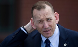 Randolph "Tex" Alles stands before a dedication ceremony at the Homeland Security headquarters Center Building at the old St. Elizabeths Hospital, Wednesday, April 10, 2019.