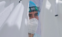 A National Guardsman looks on at the Utah National Guard's mobile testing site for COVID-19 Thursday, Nov. 12, 2020, in Salt Lake City.