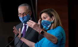 Speaker of the House Nancy Pelosi, D-Calif., and Senate Minority Leader Chuck Schumer, D-N.Y., left, meet with reporters on Capitol Hill on November 12.