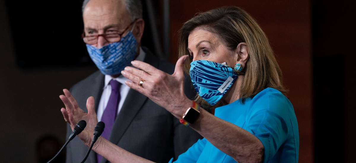 Speaker of the House Nancy Pelosi, D-Calif., and Senate Minority Leader Chuck Schumer, D-N.Y., left, meet with reporters on Capitol Hill on November 12.