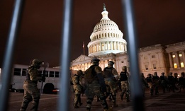 Members of the National Guard arrive to secure the area outside the U.S. Capitol, Wednesday, Jan. 6, 2021, in Washington.