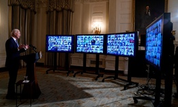 President Biden speaks during a virtual swearing in ceremony of political appointees from the State Dining Room of the White House on Wednesday. 