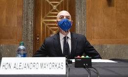 Homeland Security Secretary nominee Alejandro Mayorkas takes his seat to testify during his confirmation hearing on Tuesday.