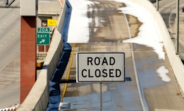 A sign blocks an on ramp to Interstate 410 on Friday in San Antonio, Texas. Many roads, highways and interstates remain closed due to icy conditions.